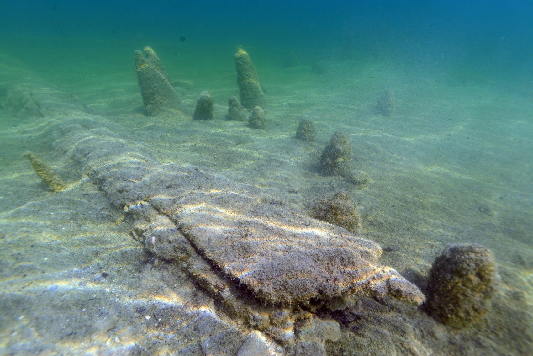 Überreste einer steinzeitlichen Siedlung im Keutschacher See